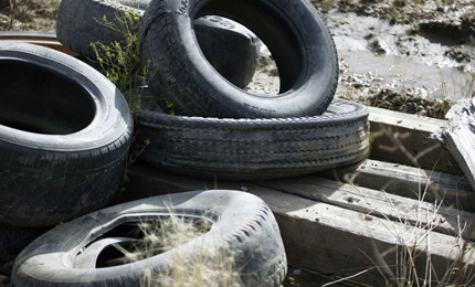 Old tires that have been illegally dumped