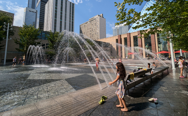 Kids playing in City Hall Fountain