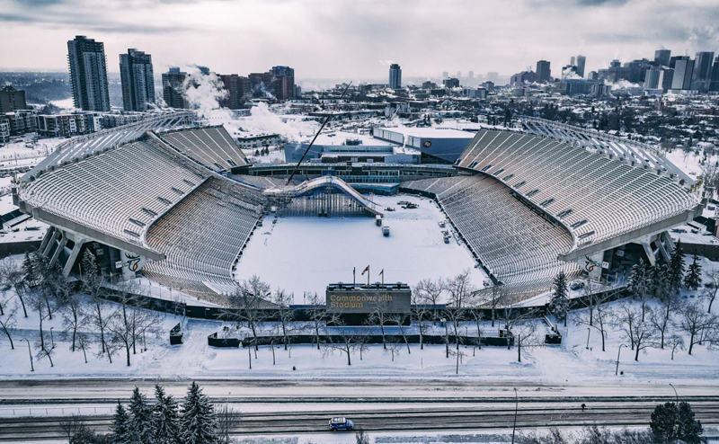 Commonwealth Stadium during winter. A ramp has been set up in the stadium for an event.
