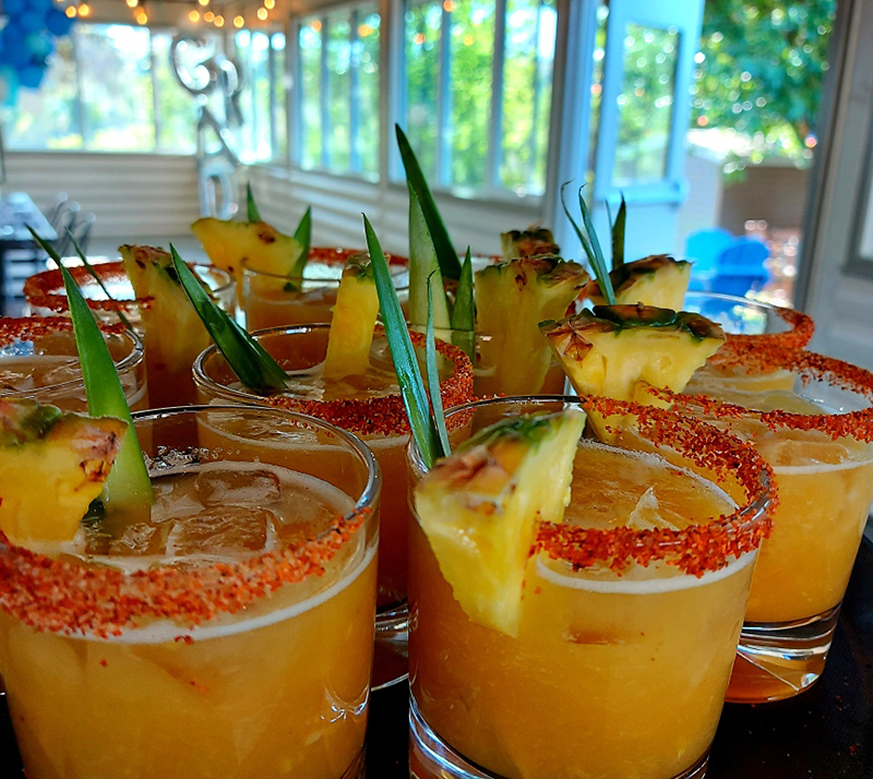 Cocktails on a tray in the Riverside Space.