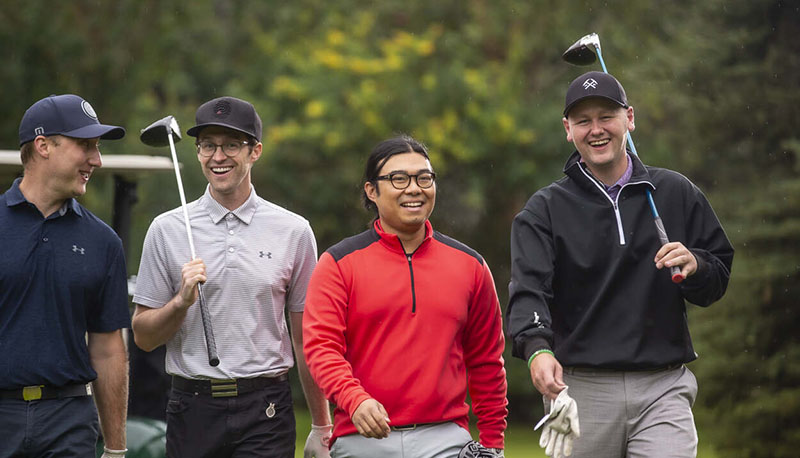 Group of men golfing