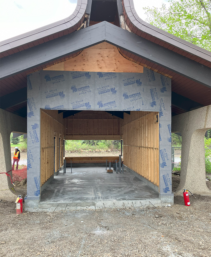 The Boat House being reconstructed within a preserved concrete column-and-beam system