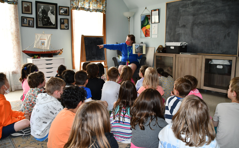 An instructor presenting a program to a group of students.