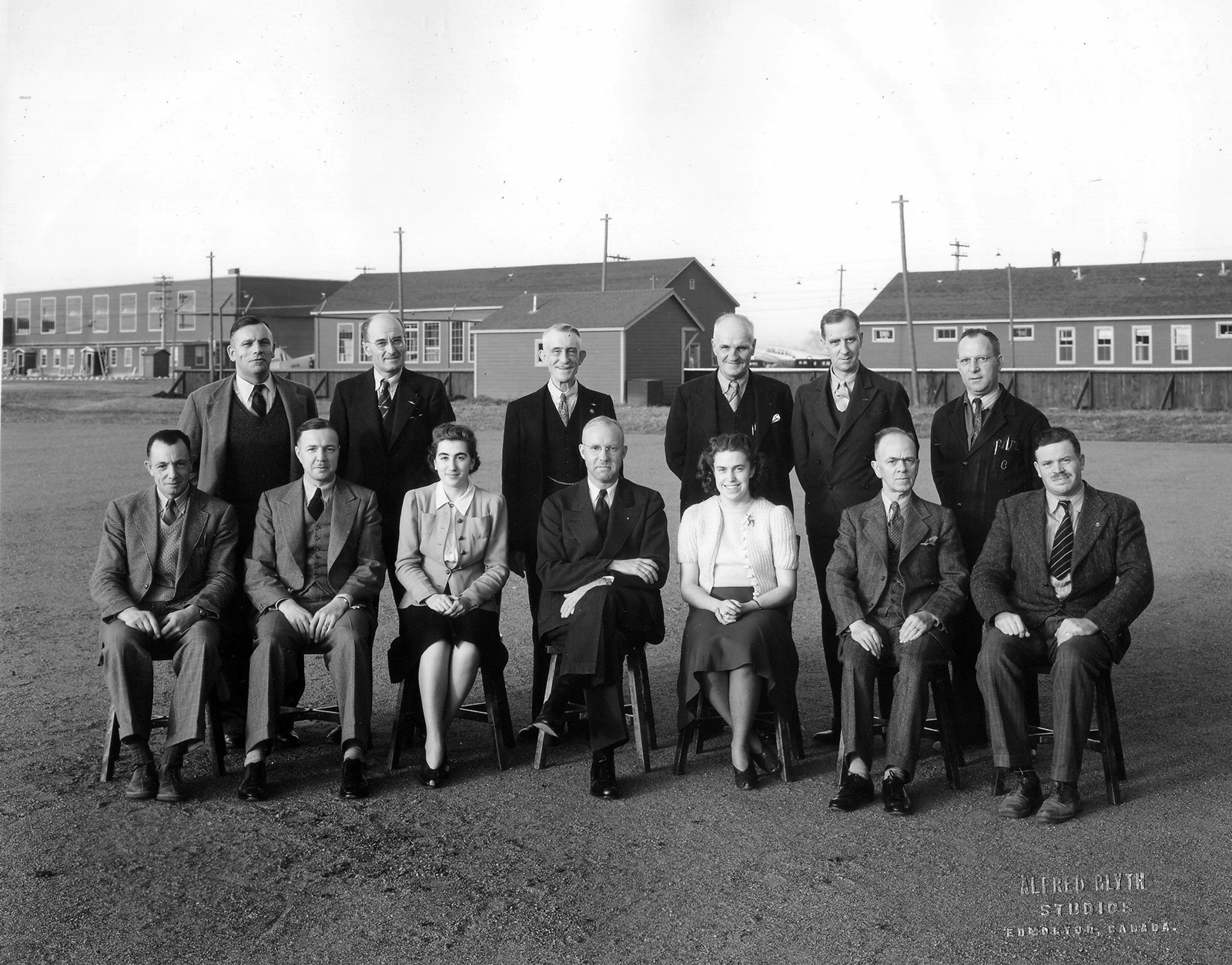 Wop May, centre, with civilian staff of No. 2 Air Observer School