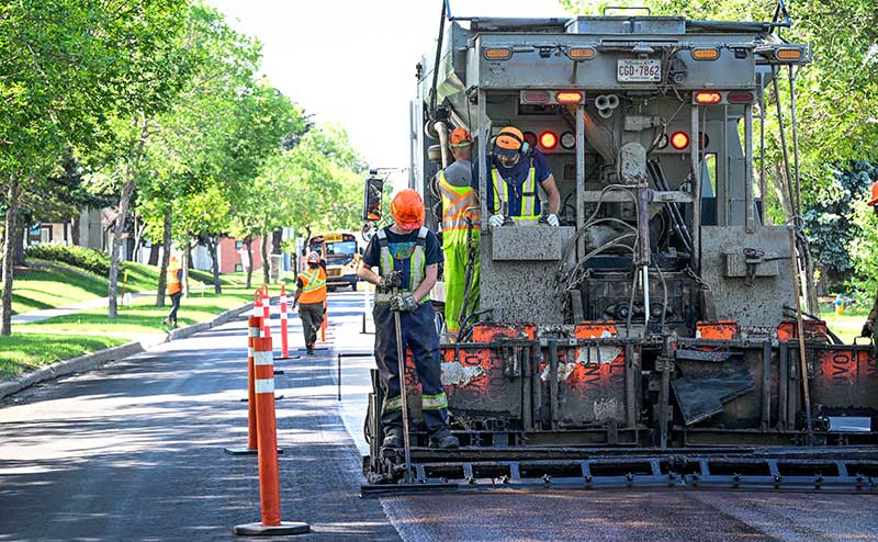 rear view of the material being applied to the road surface