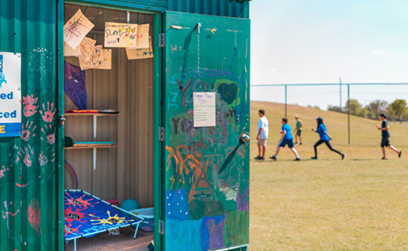 Kids playing at a Green Shack