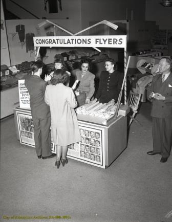 Women handing out souvenirs