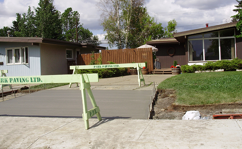 Curb crossing in front of a residence