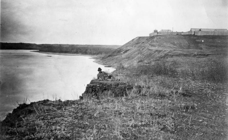 Historical photo of a man on Edmonton's river valley bank.