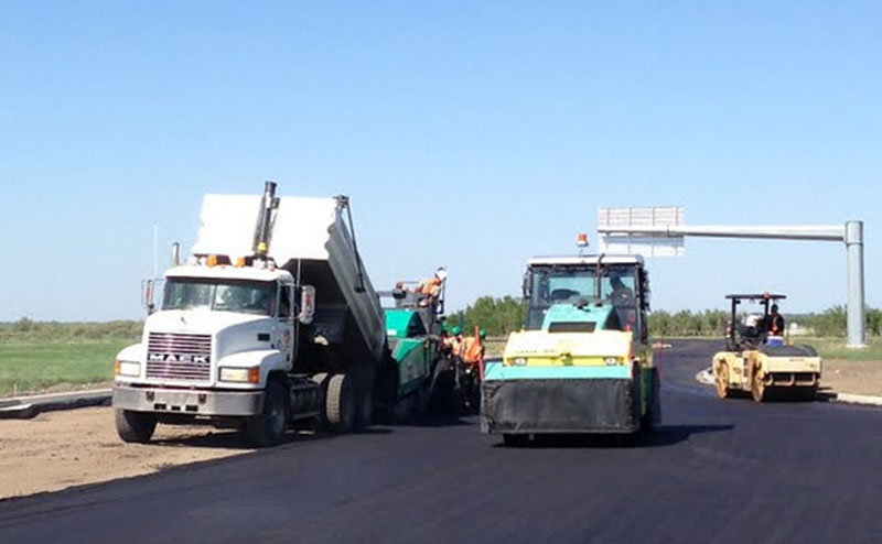 vehicles on newly paved road