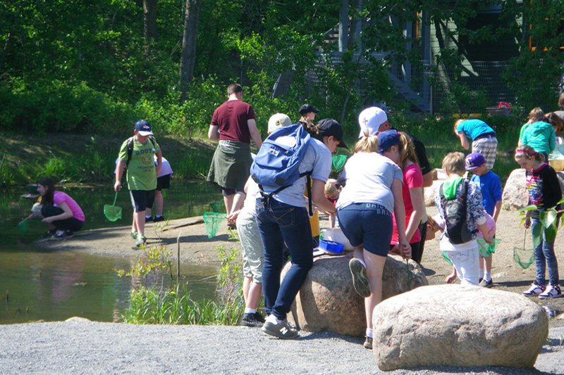 Students and teachers engaged in a program at JJNC.