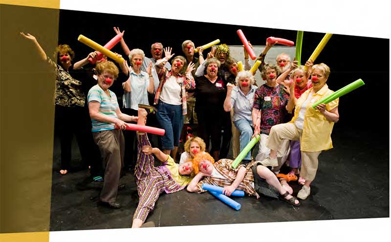 Photo of a group of seniors on a stage.