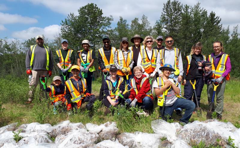 Community weed pull volunteers