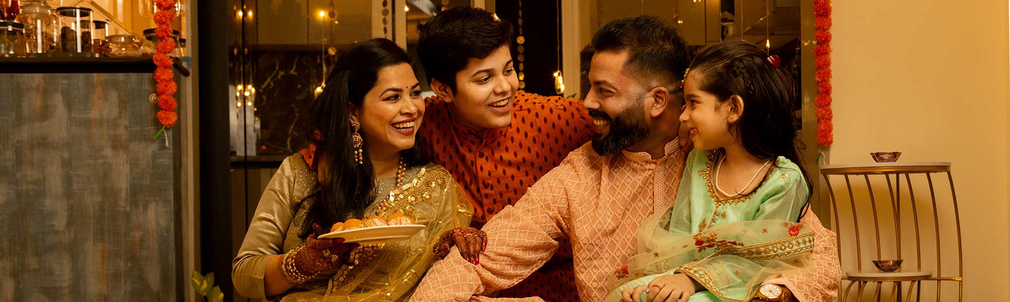 happy family at home celebrating Diwali