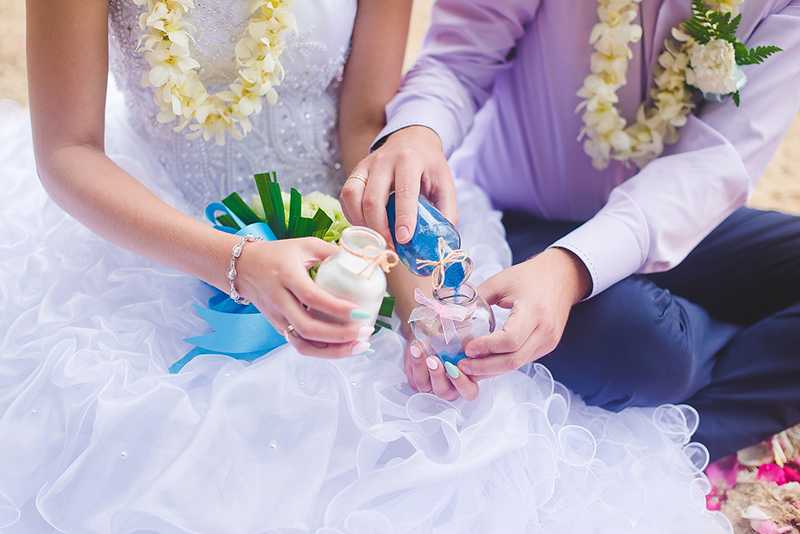 Bride and groom holding hands