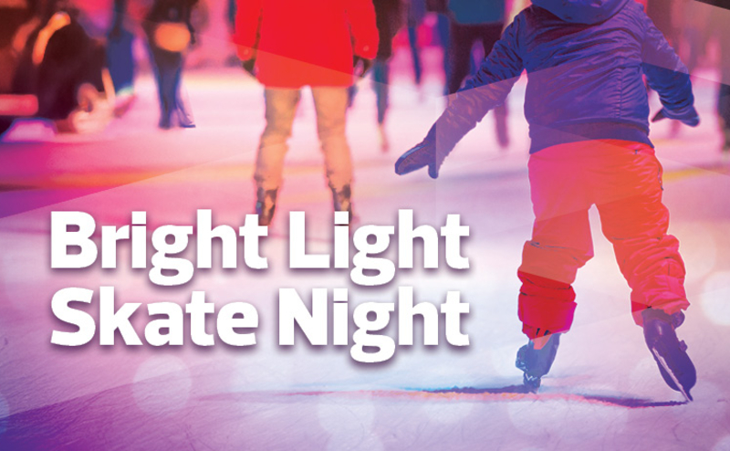 People ice skating at Bright Light Skate Night