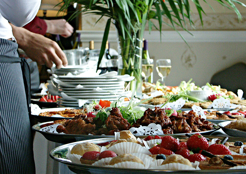 Close up of a buffet table with food