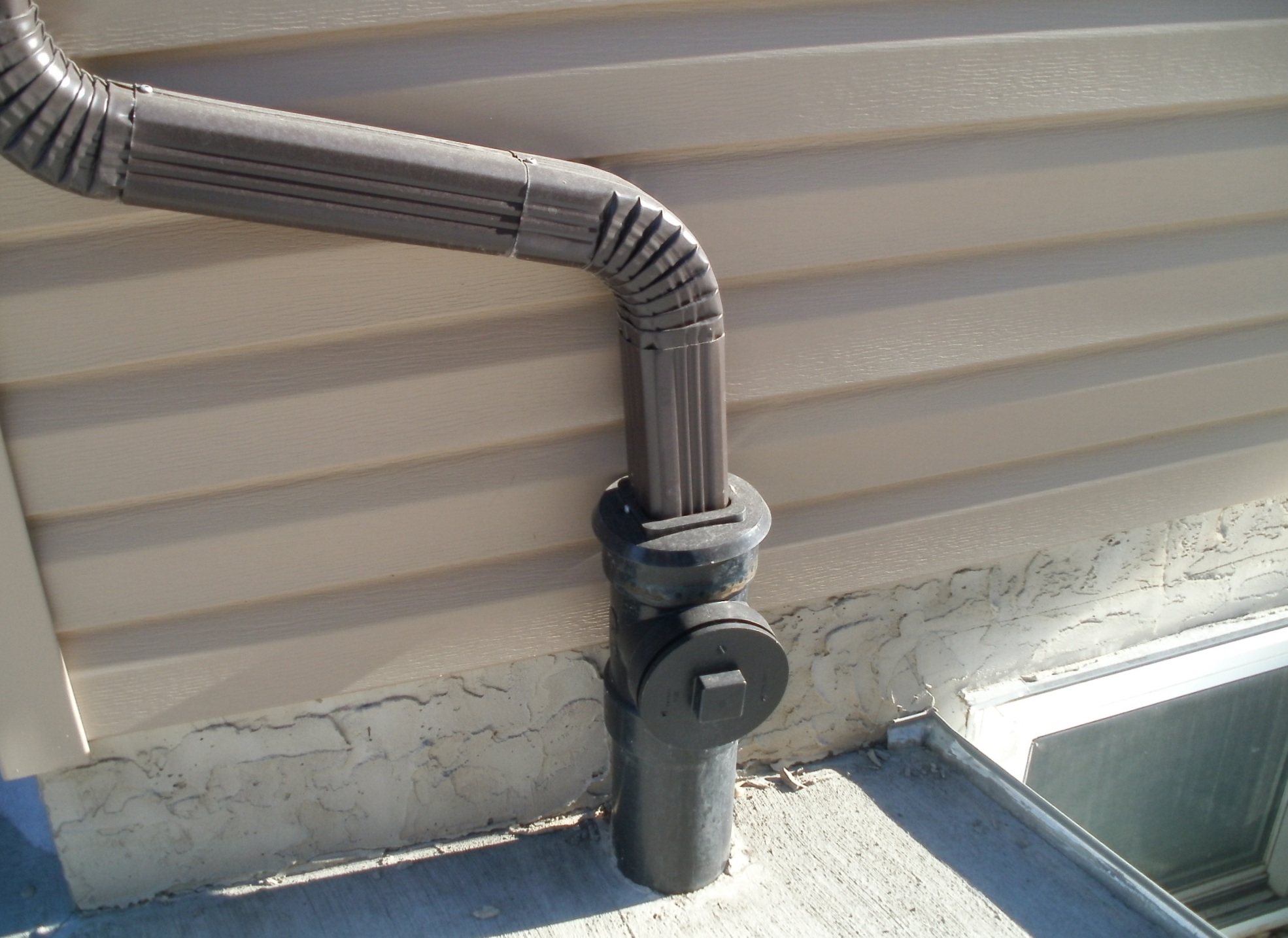 Downspout and Storm Service Connection