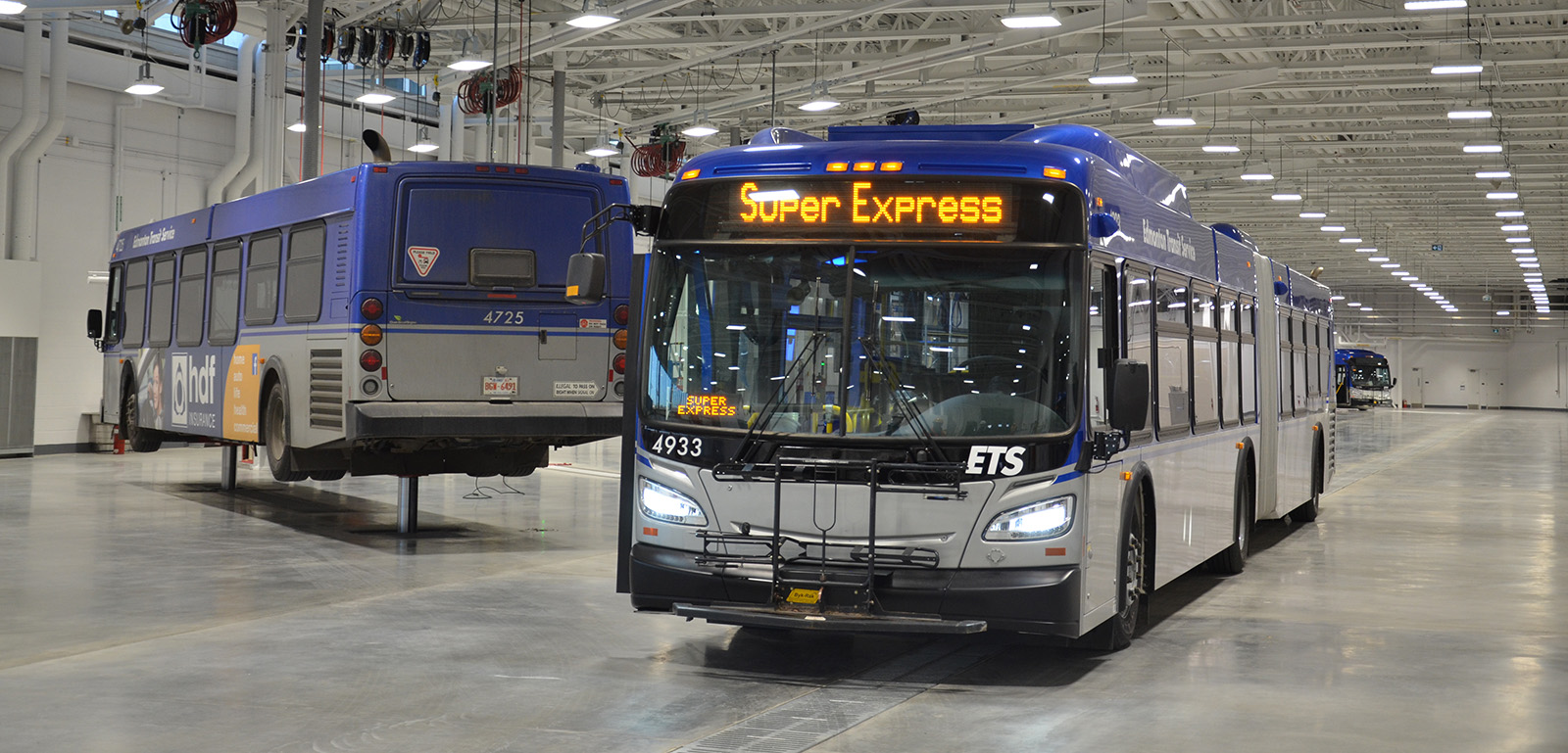 City buses in the transit barn