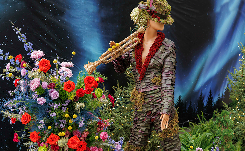 mannequin dressed and surrounded by flowers