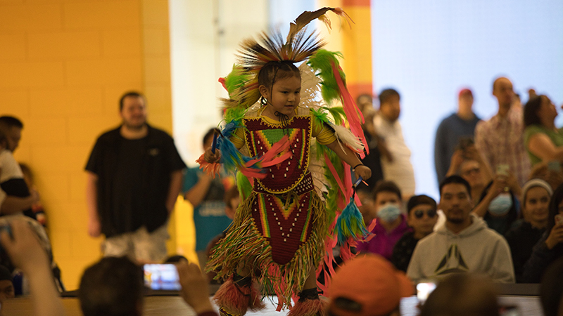 indigenous child in headdress