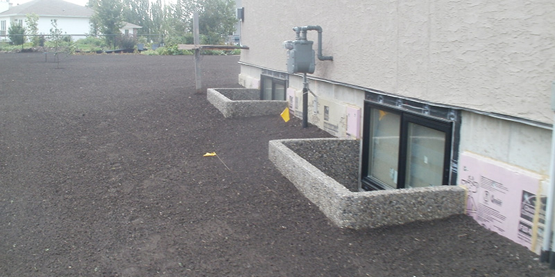 Grading around a basement window well