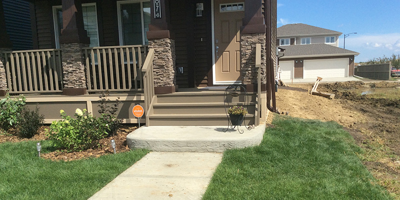 Graded lot in front of a house