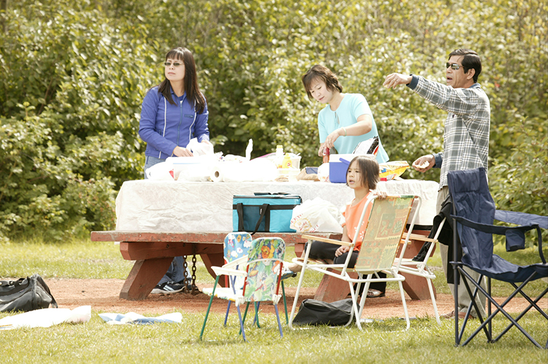 A family having a picnic in a City park