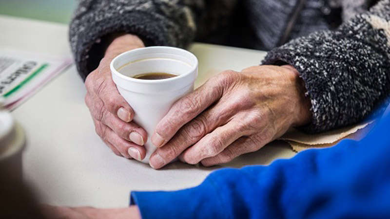 hands holding a mug