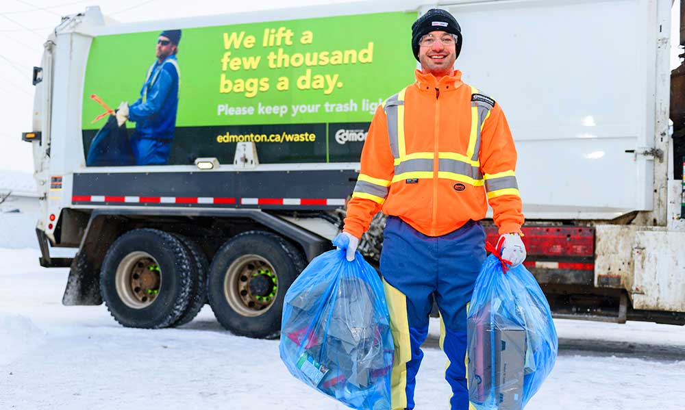 waste collector with recycle bags in winter