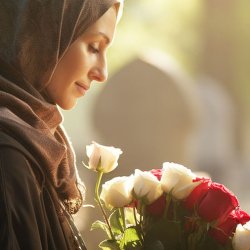 person holding bunch of roses