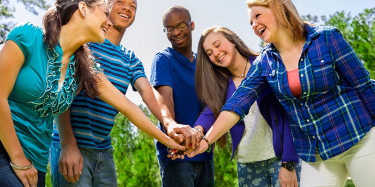 teens joined hands
