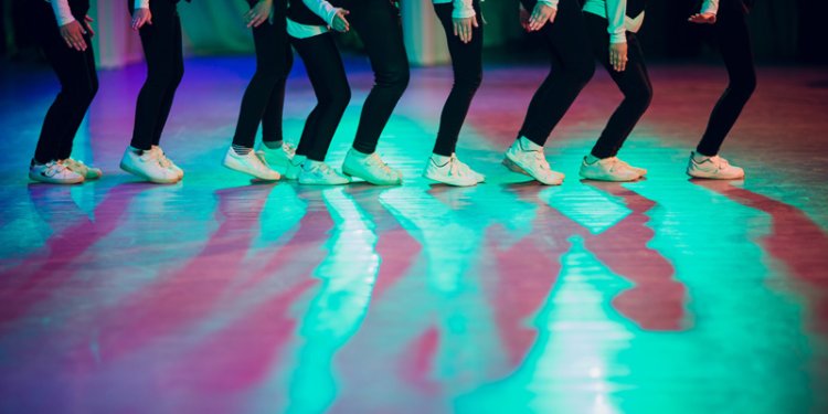 legs of kids dancing in studio
