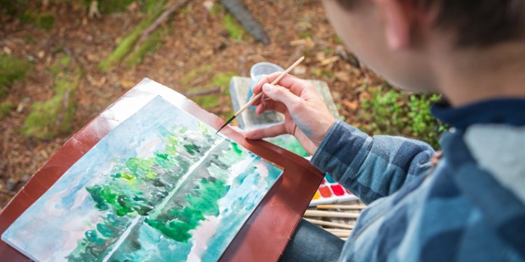 person doing landscape in watercolour