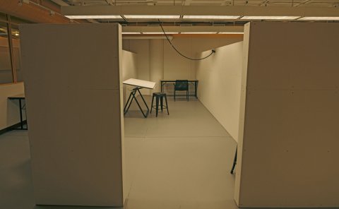 art studio with a table and chair