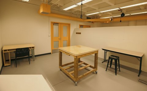 art studio with a table and chair