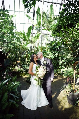 Bride and groom posing for photos in the Arid Pyramid