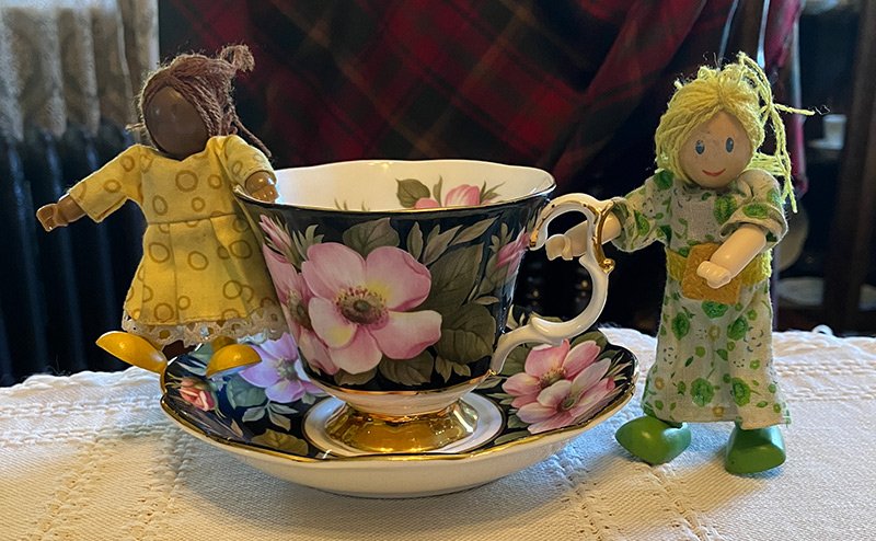 teacup with two craft figures