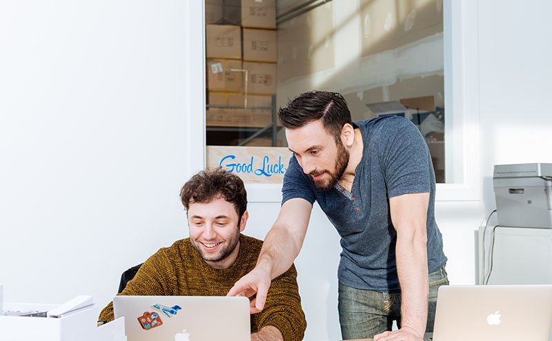 Business owners working on a laptop