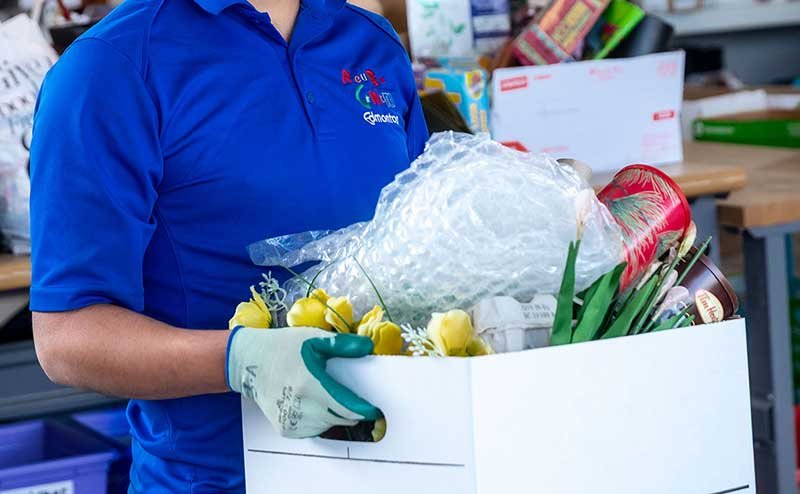 person with donation box