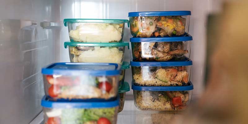 lunch containers in fridge with food
