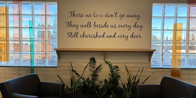 waiting room with writing etched on wall